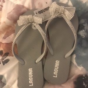 Silver bow flip flops